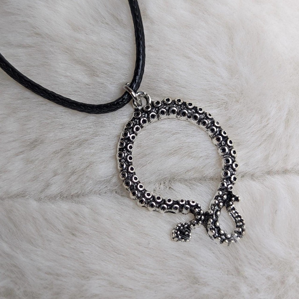 Octopus tentacle charm necklace